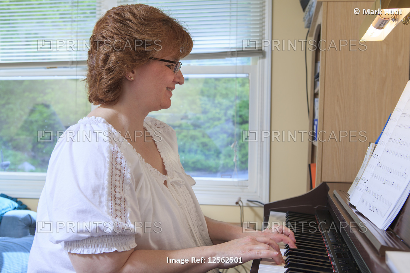 Woman with RSD playing her piano