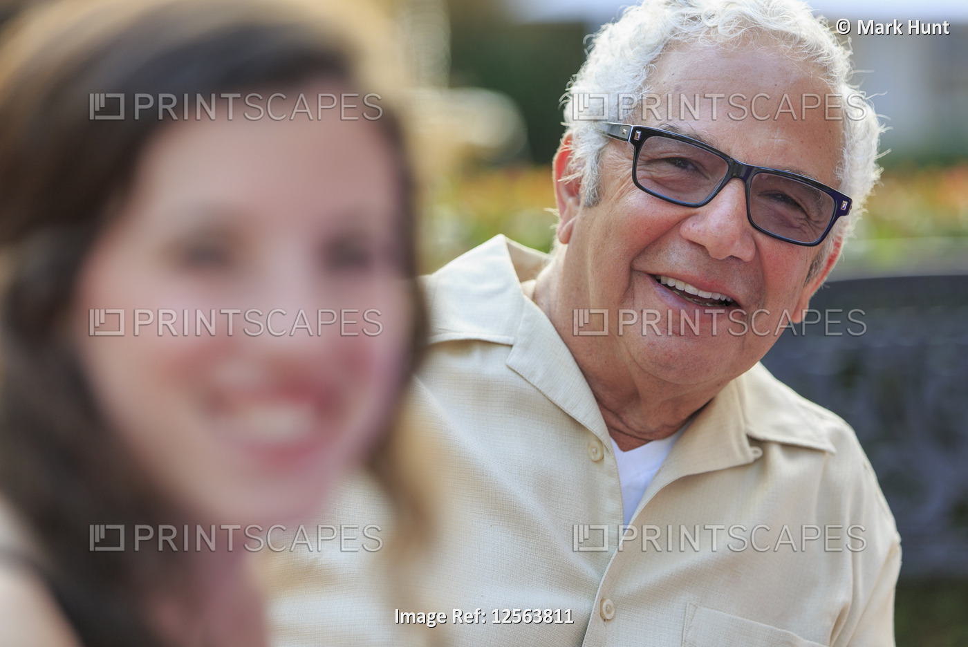 Portrait of happy senior father with daughter