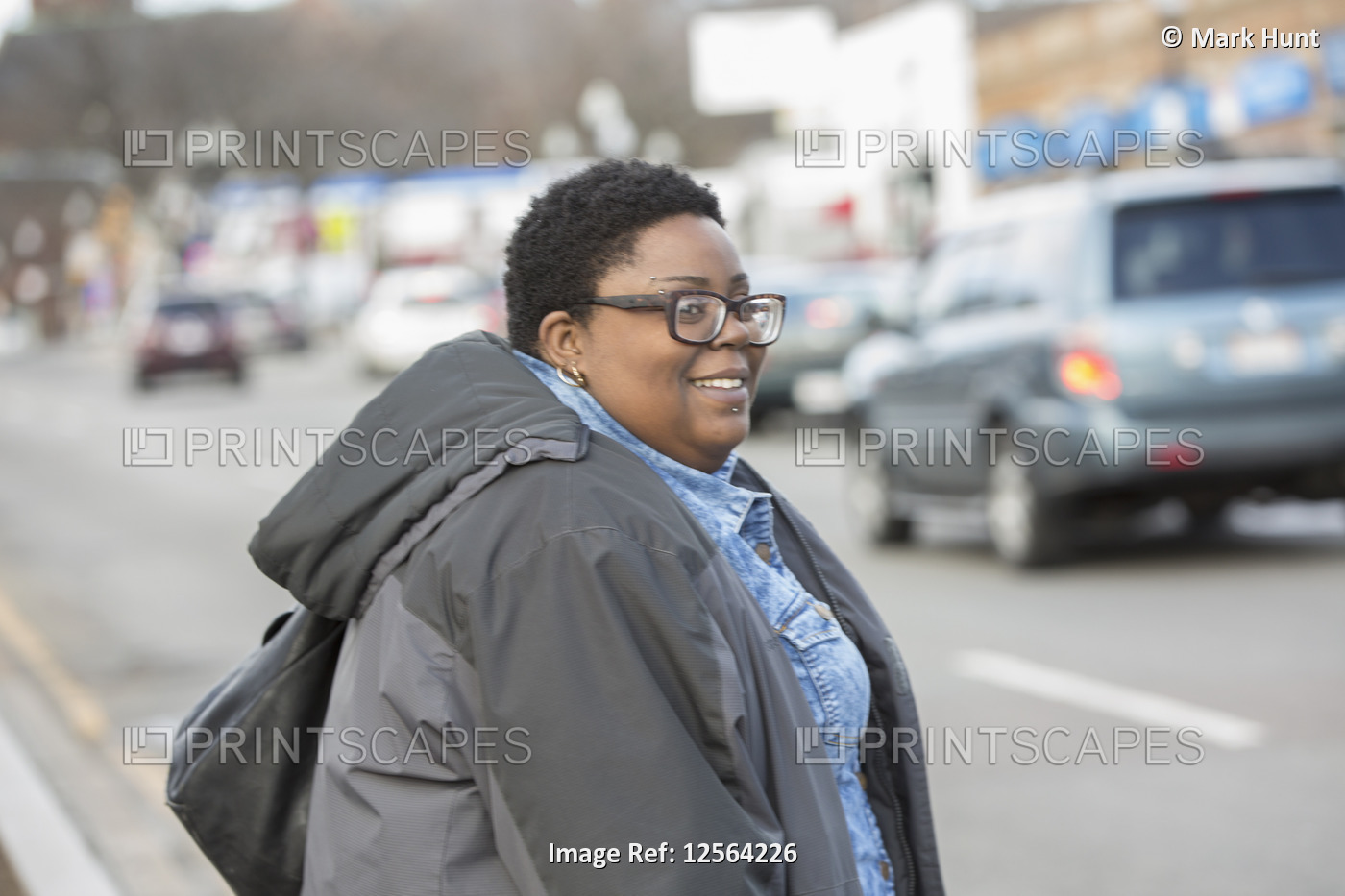 Happy woman with bipolar disorder walking in her neighborhood