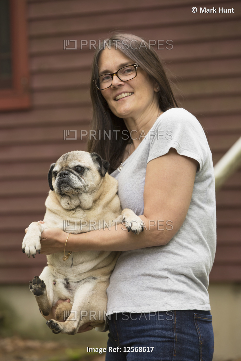 Woman with Multiple Sclerosis holding her dog