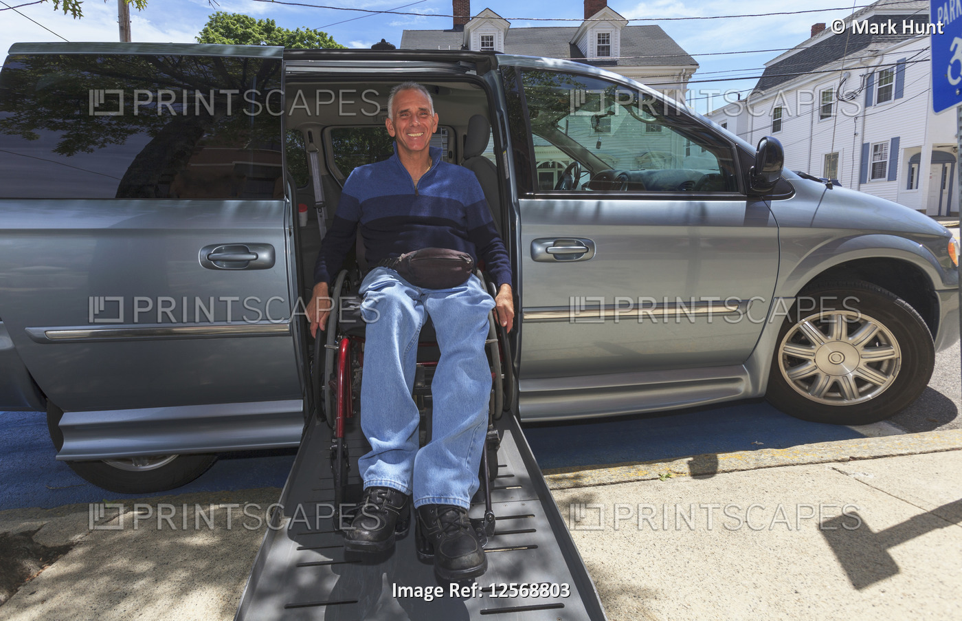 Man with Spinal Cord Injury exiting his accessible van