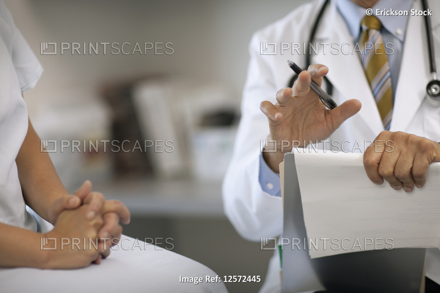 Senior doctor consulting with a patient after a medical exam