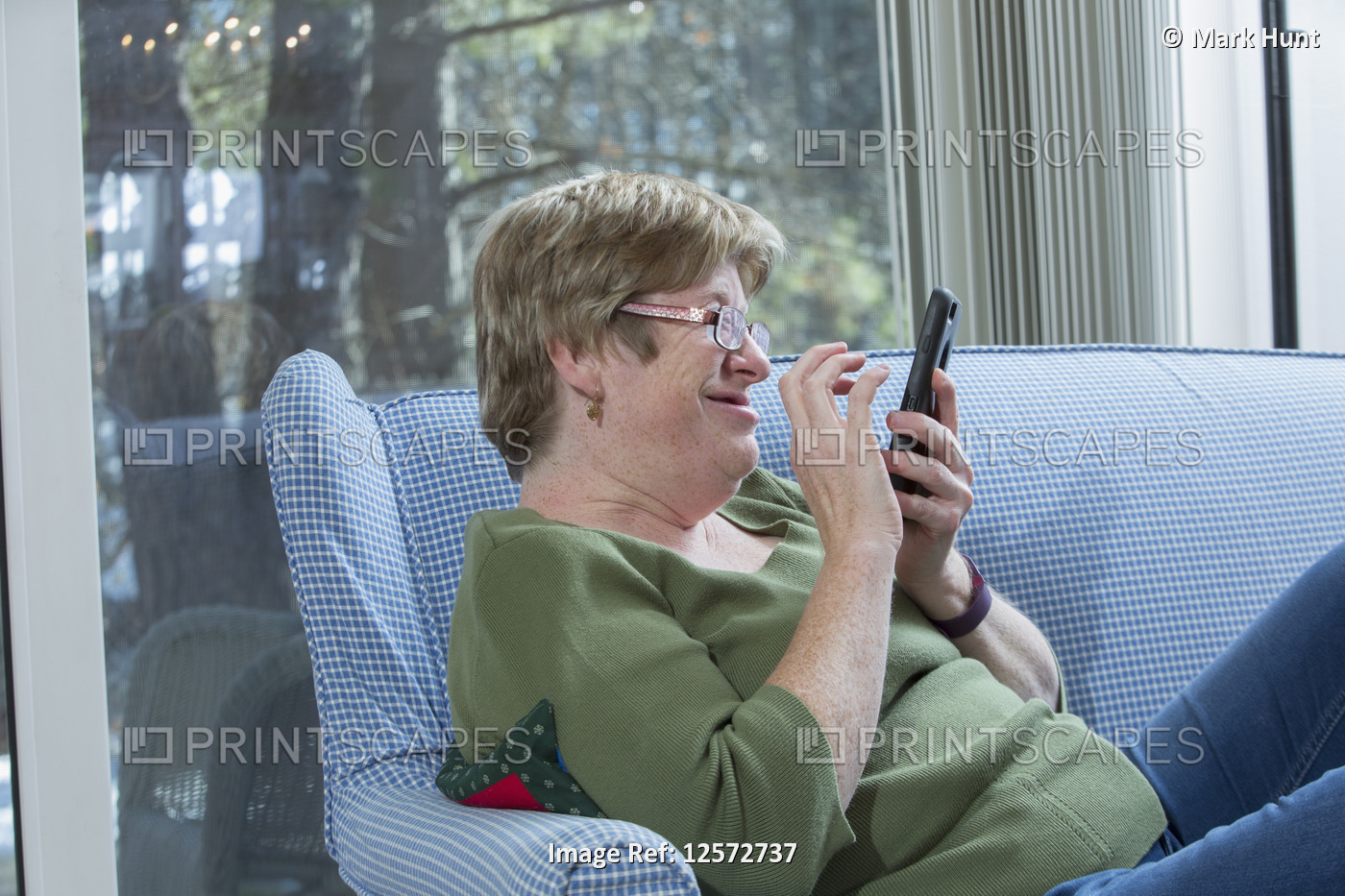 Woman with Autism using a smartphone