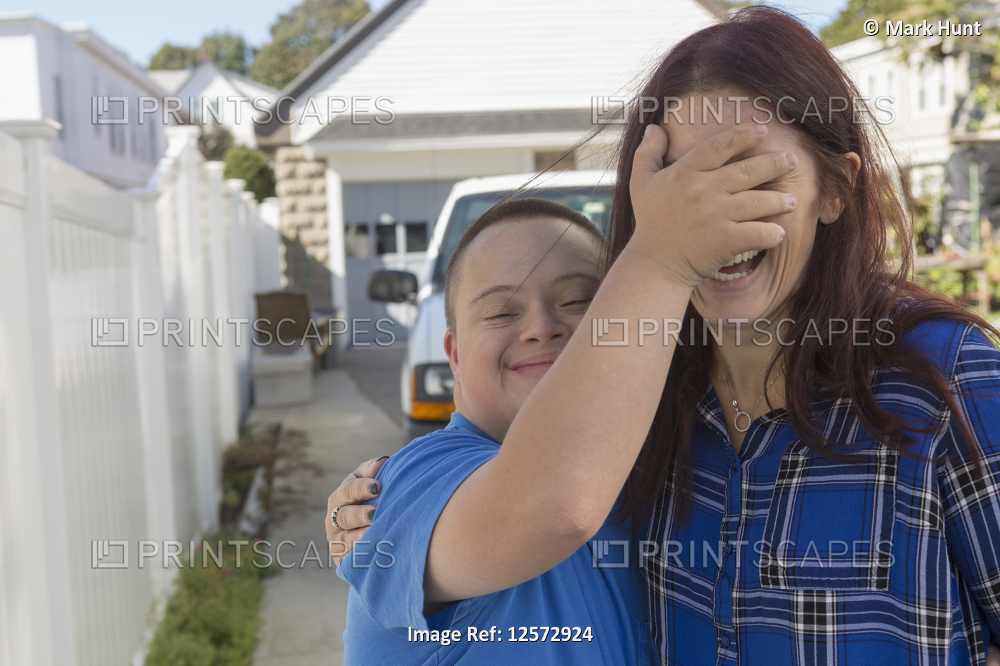 Teen who has Down Syndrome with his friend