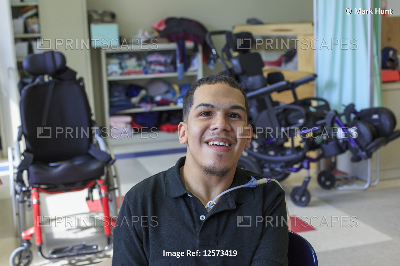Boy with Spastic Quadriplegic Cerebral Palsy learning at school