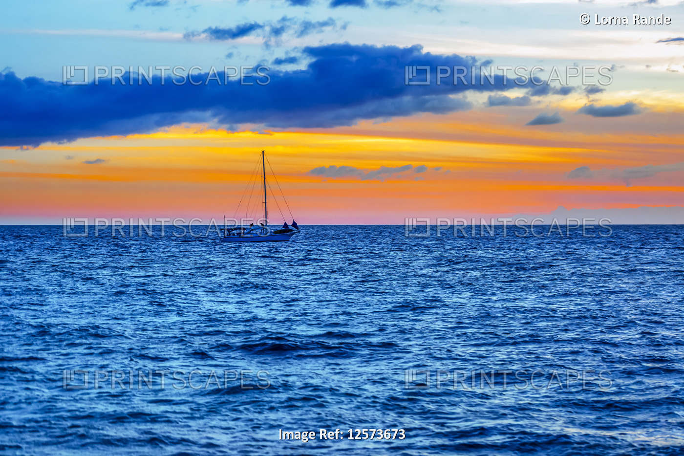 Sailboat in the ocean off the coast of Kamaole One and Two beaches, Kamaole ...