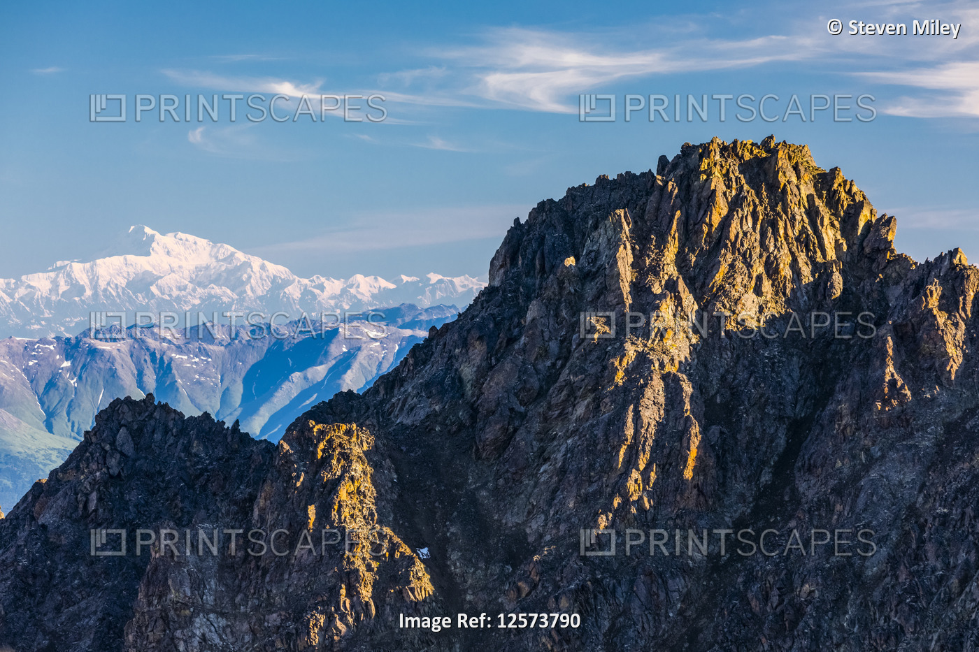 Summit of Pioneer Peak with Denali in the background, Chugach Mountains; ...
