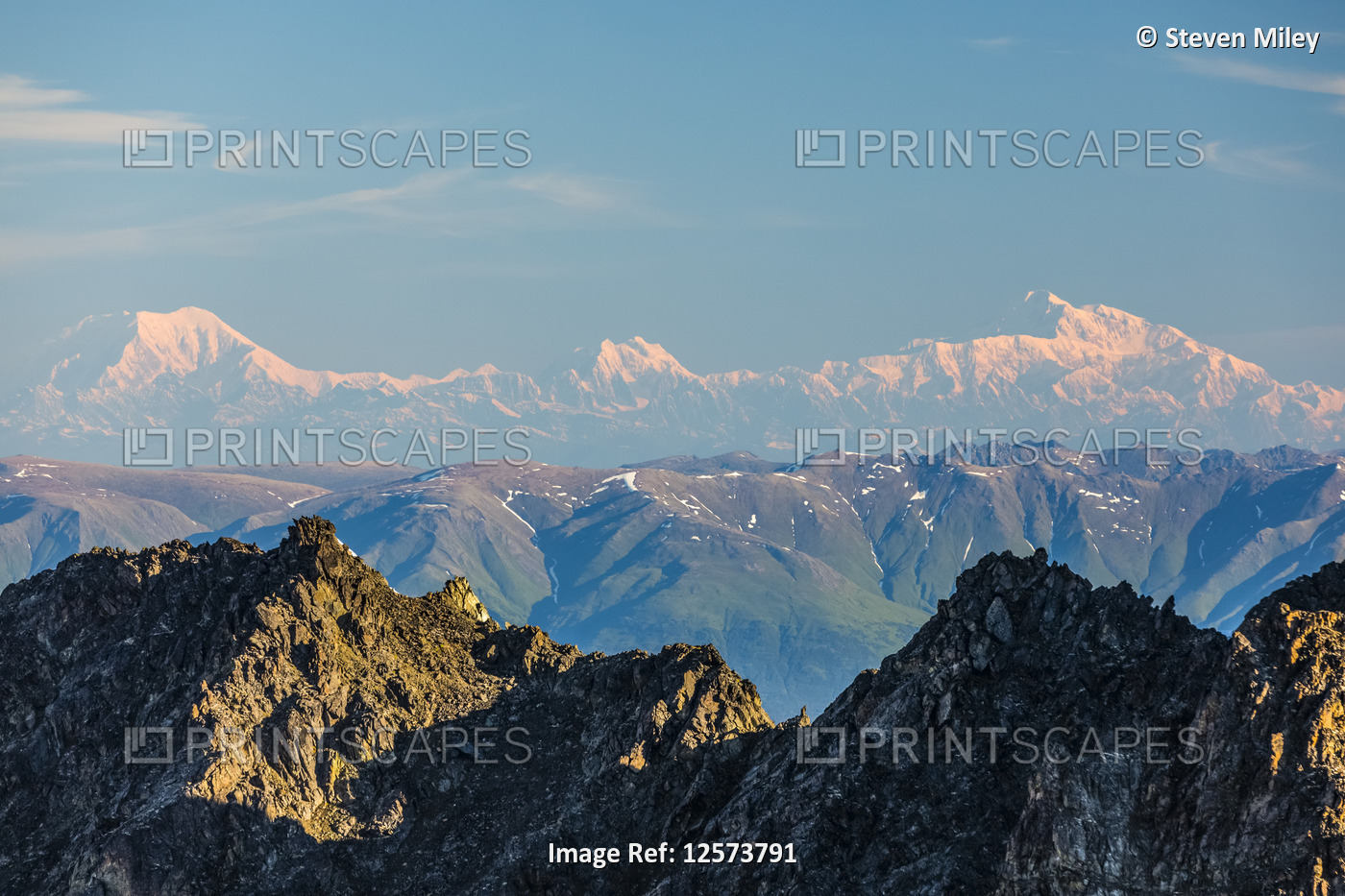 Distant view of Mount Foraker (left), Mount Hunter (center), and Denali (right) ...