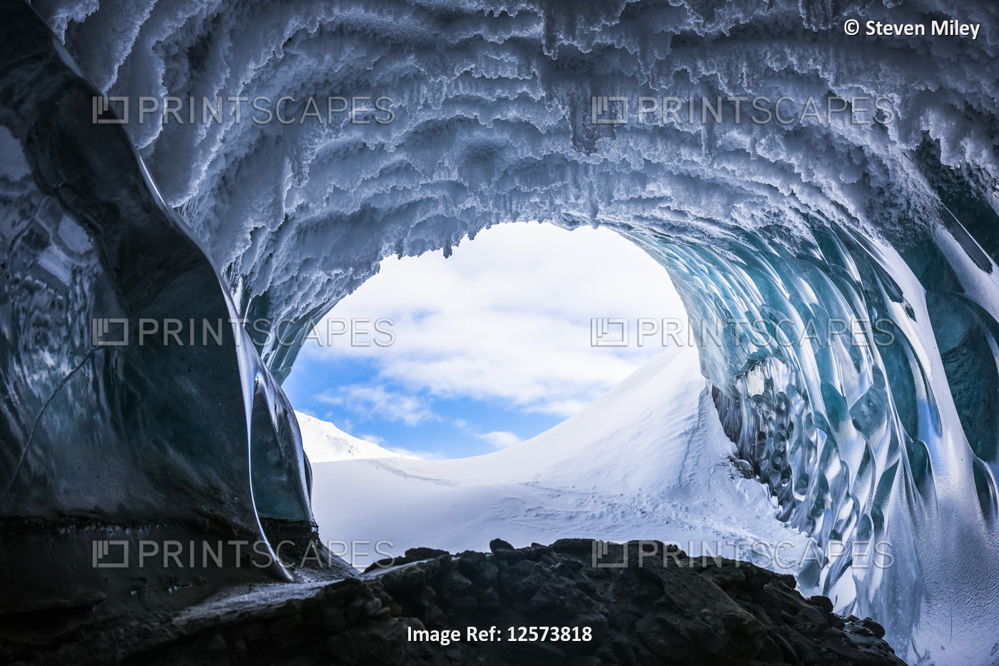 Hoarfrost hangs from the ceiling of a Canwell Glacier ice cave in winter; ...