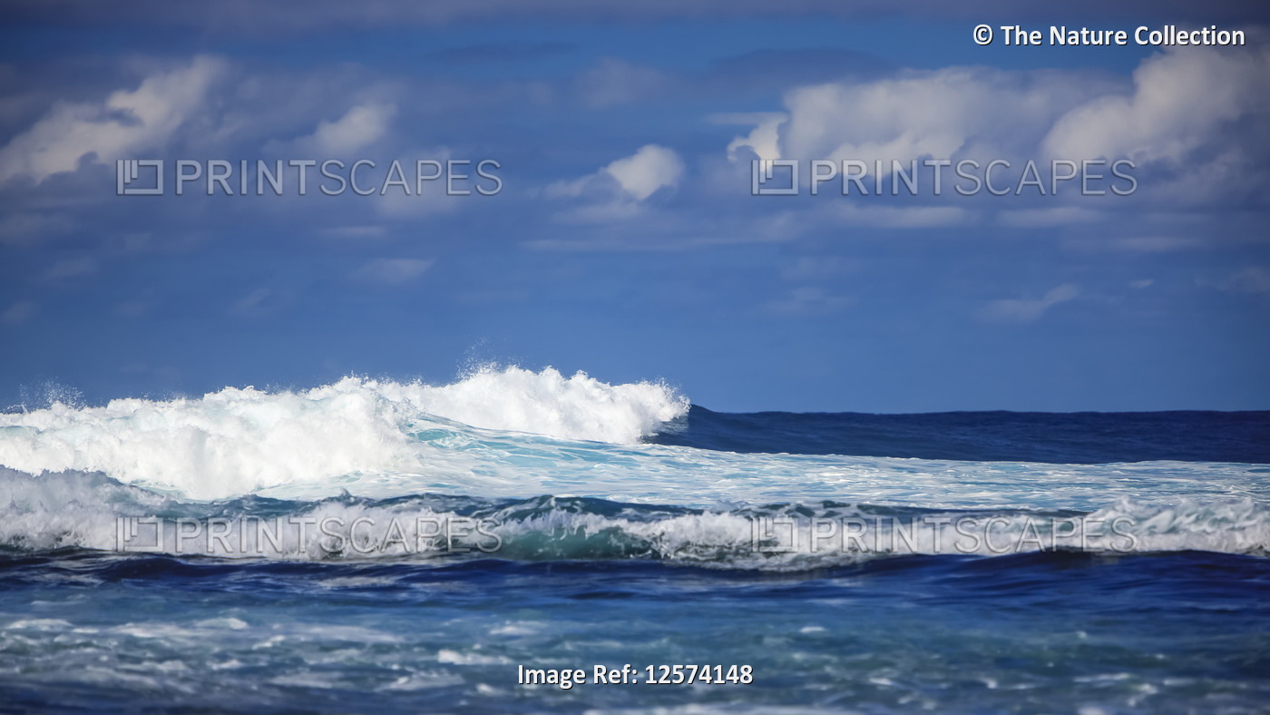 Waves breaking in the Pacific Ocean off the coast of Kauai, East Beaches; ...