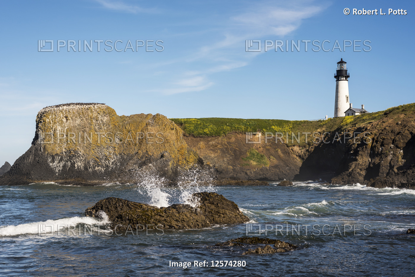 A beautiful lighthouse is found at Yaquina Head on the Oregon Coast; Newport, ...