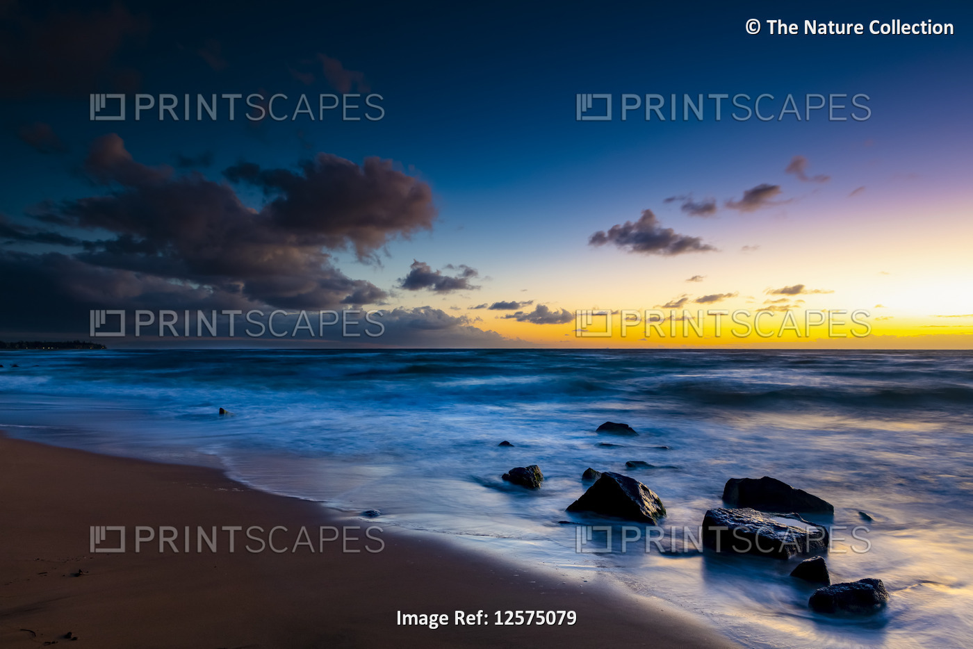 Sunrise over the ocean from the coast of Kauai; Kauai, Hawaii, United States of ...