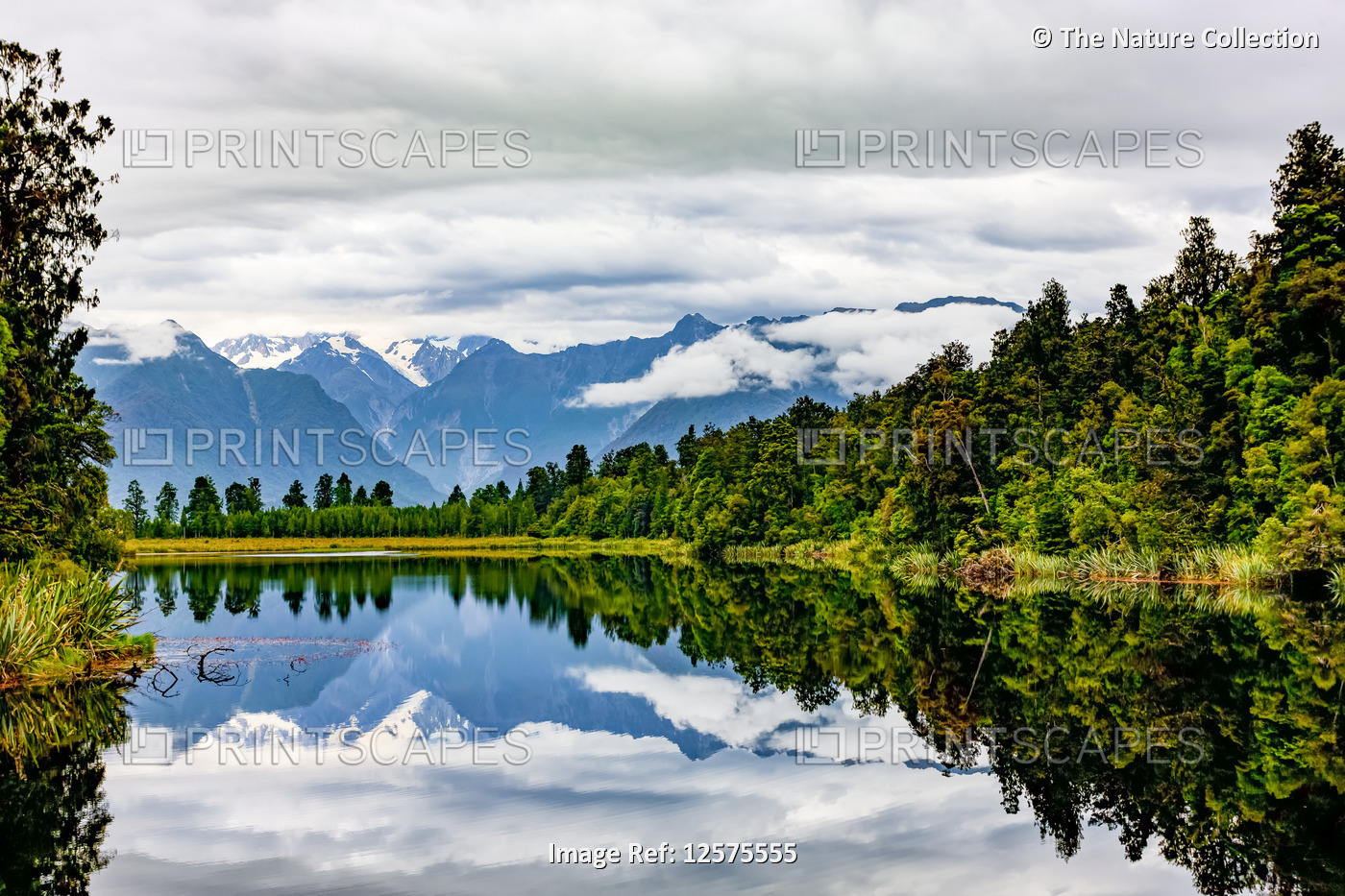 Matheson Lake reflecting the Southern Alps; South Island, New Zealand