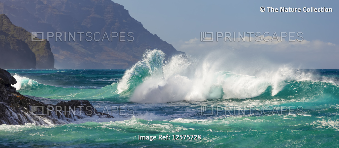 Large waves crashing along the Na Pali coast at Ke'e Beach; Kauai, Hawaii, ...