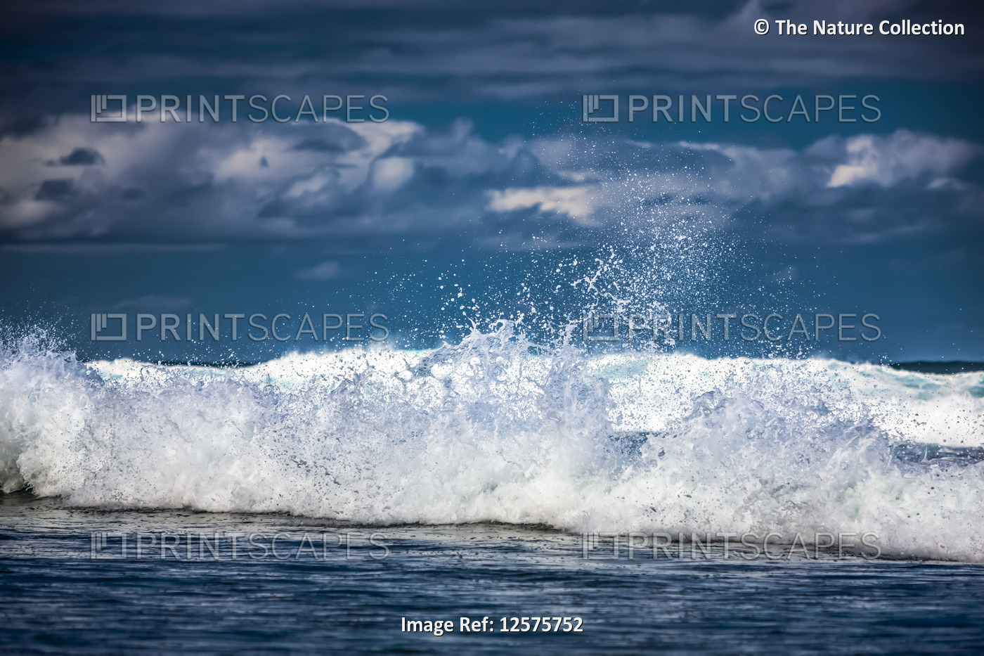 Small waves of the surf splashing at the shore; Kauai, Hawaii, United States of ...