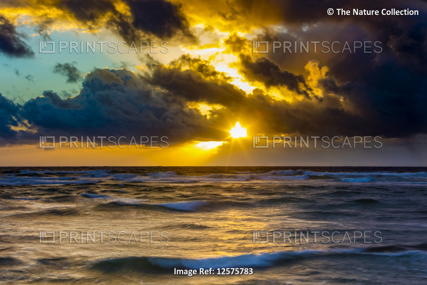 Sunrise over the Pacific Ocean and Lydgate Beach; Kapaa, Kauai, Hawaii, United ...