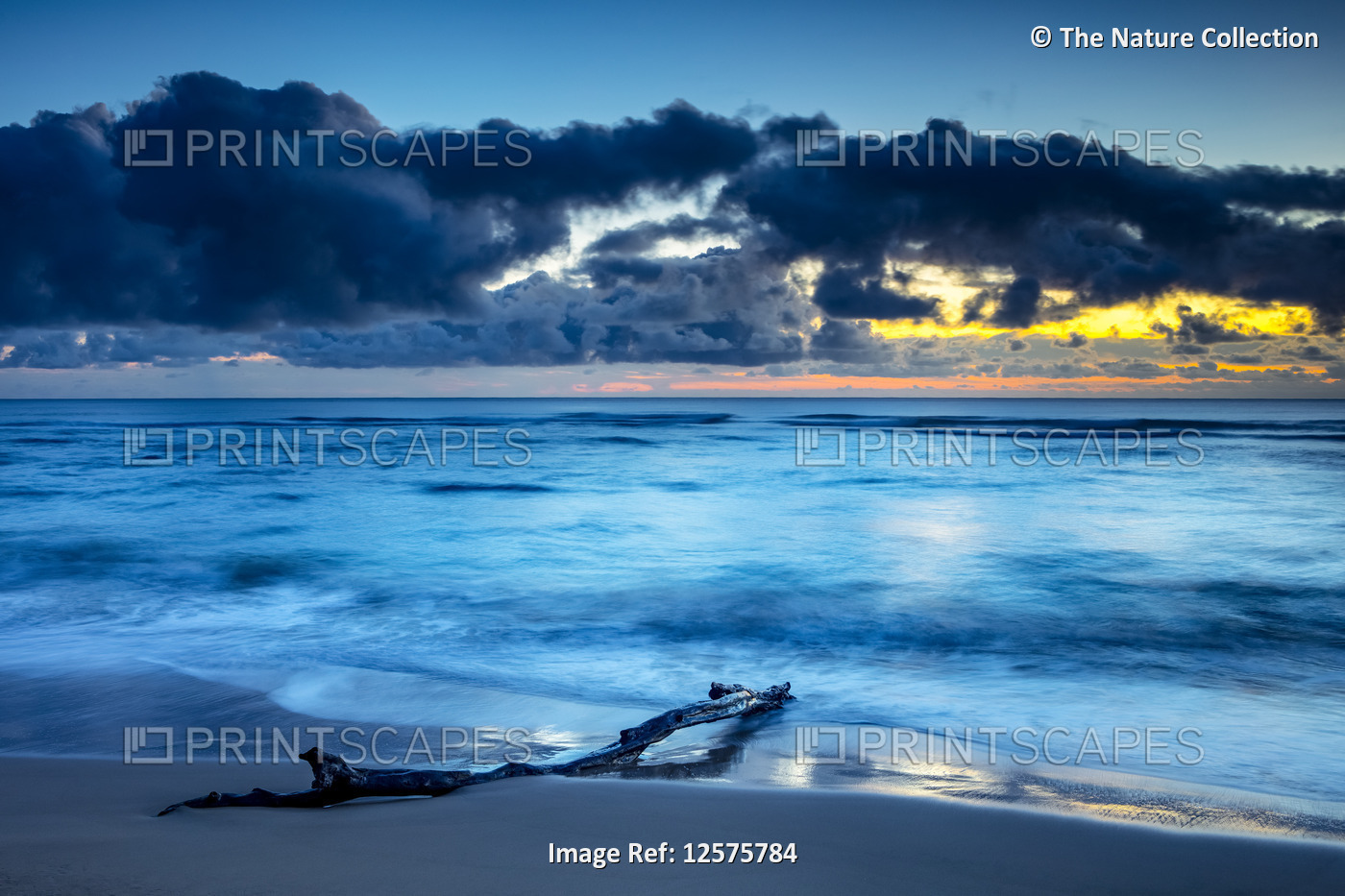 Sunrise over the Pacific Ocean from the shore of Kauai; Kauai, Hawaii, United ...