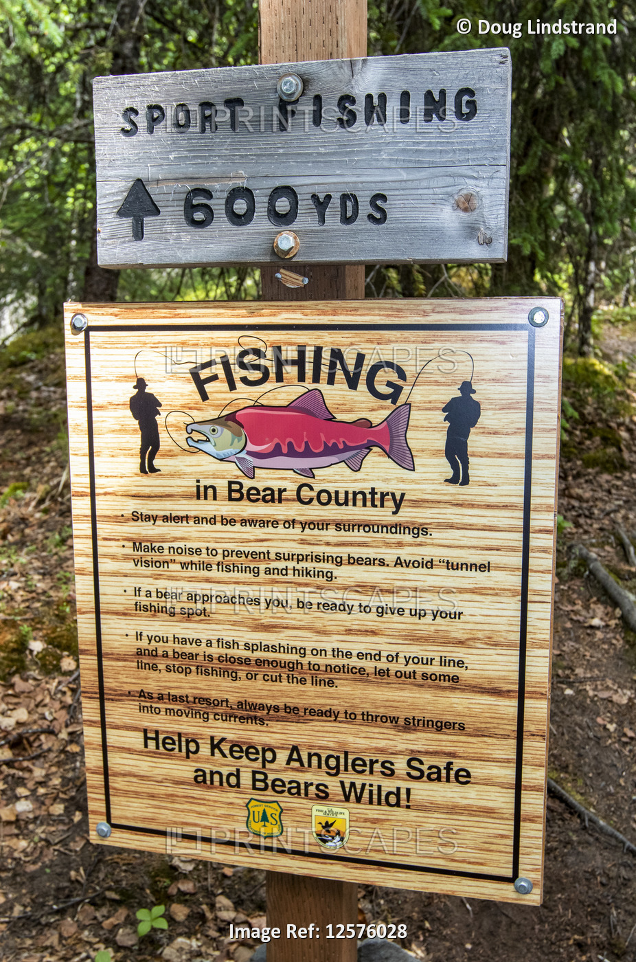 A sign with salmon fishing information posted near the Russian River Falls on ...