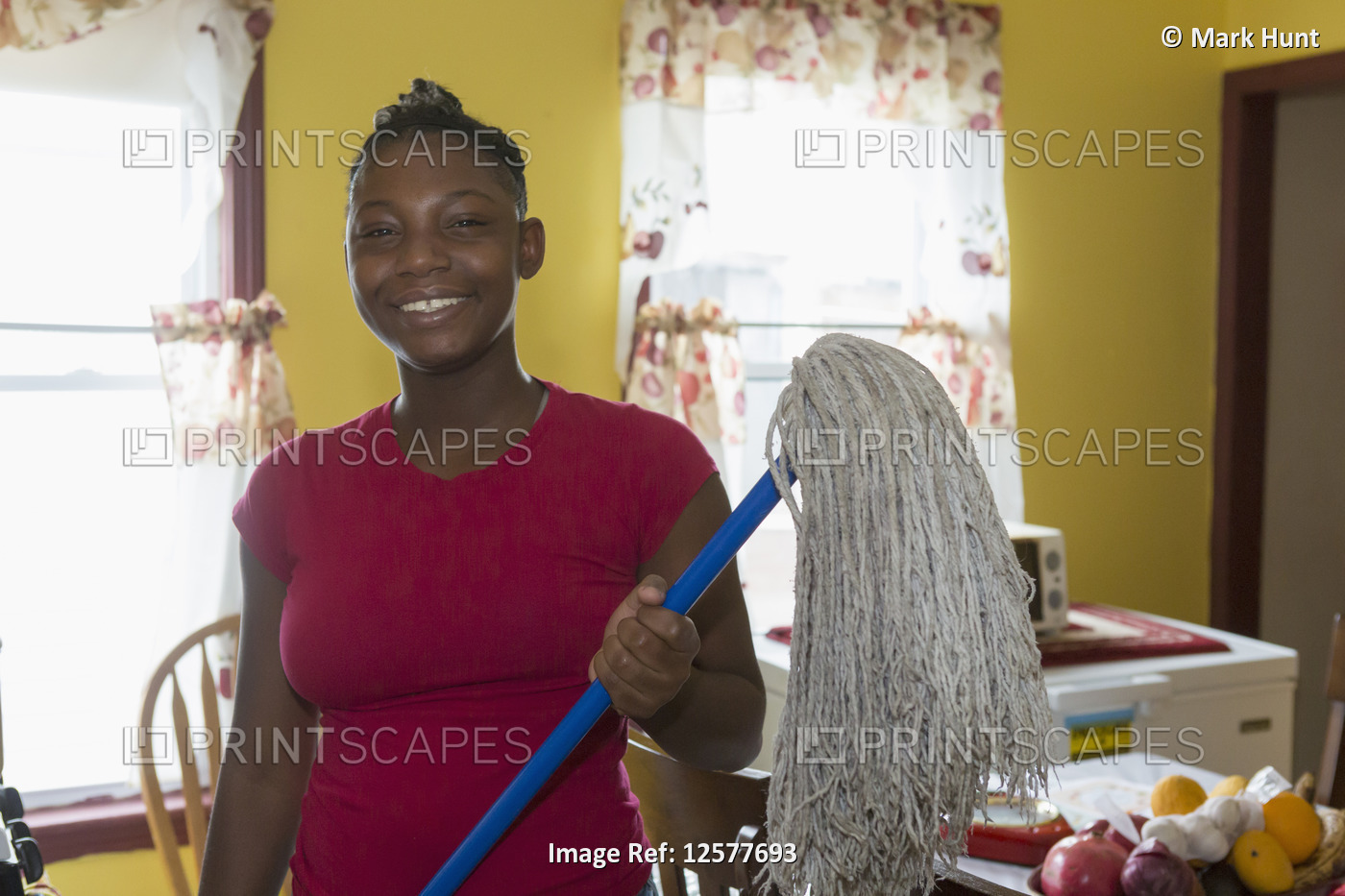 Teen suffering from Bipolar Disorder cleaning the house