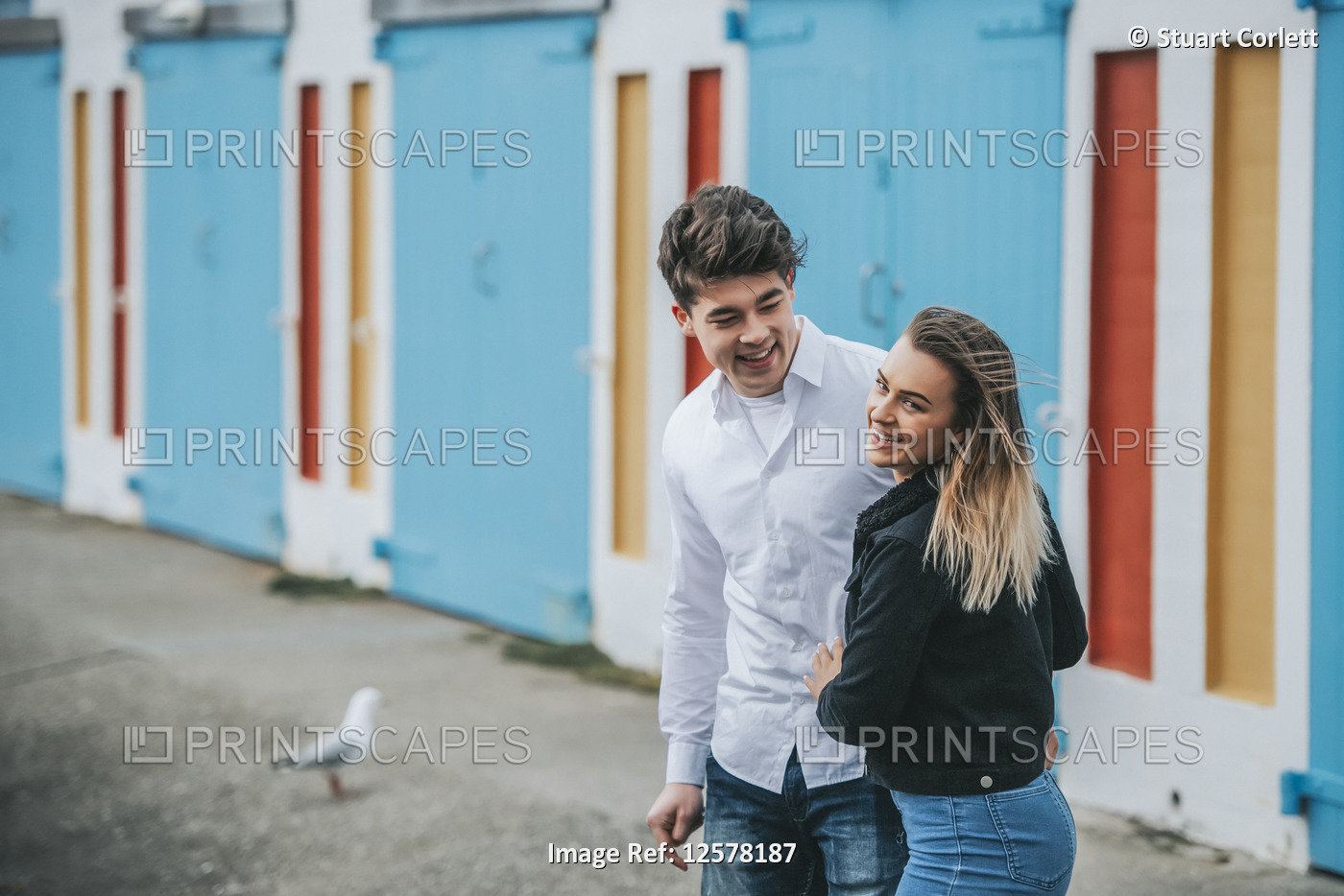 Young man and young woman smiling and laughing together; Wellington, North ...