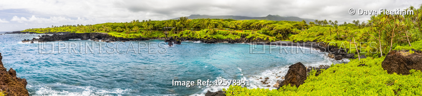 Eight photographs were combined for this panorama image of the black sand beach ...