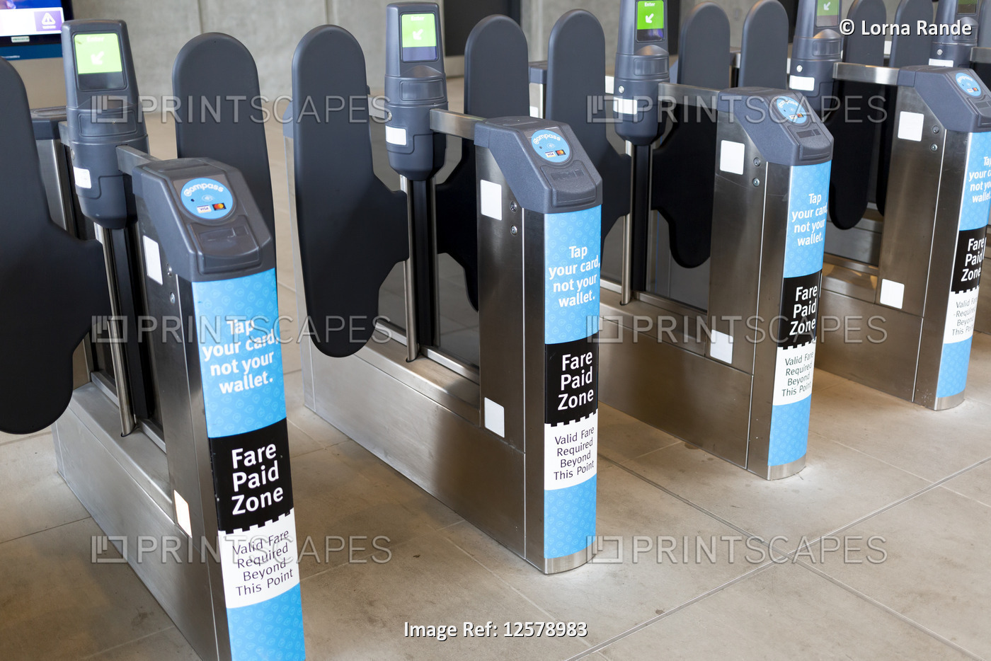 Fare paying station at light rail transit station; Surrey, British Columbia, ...