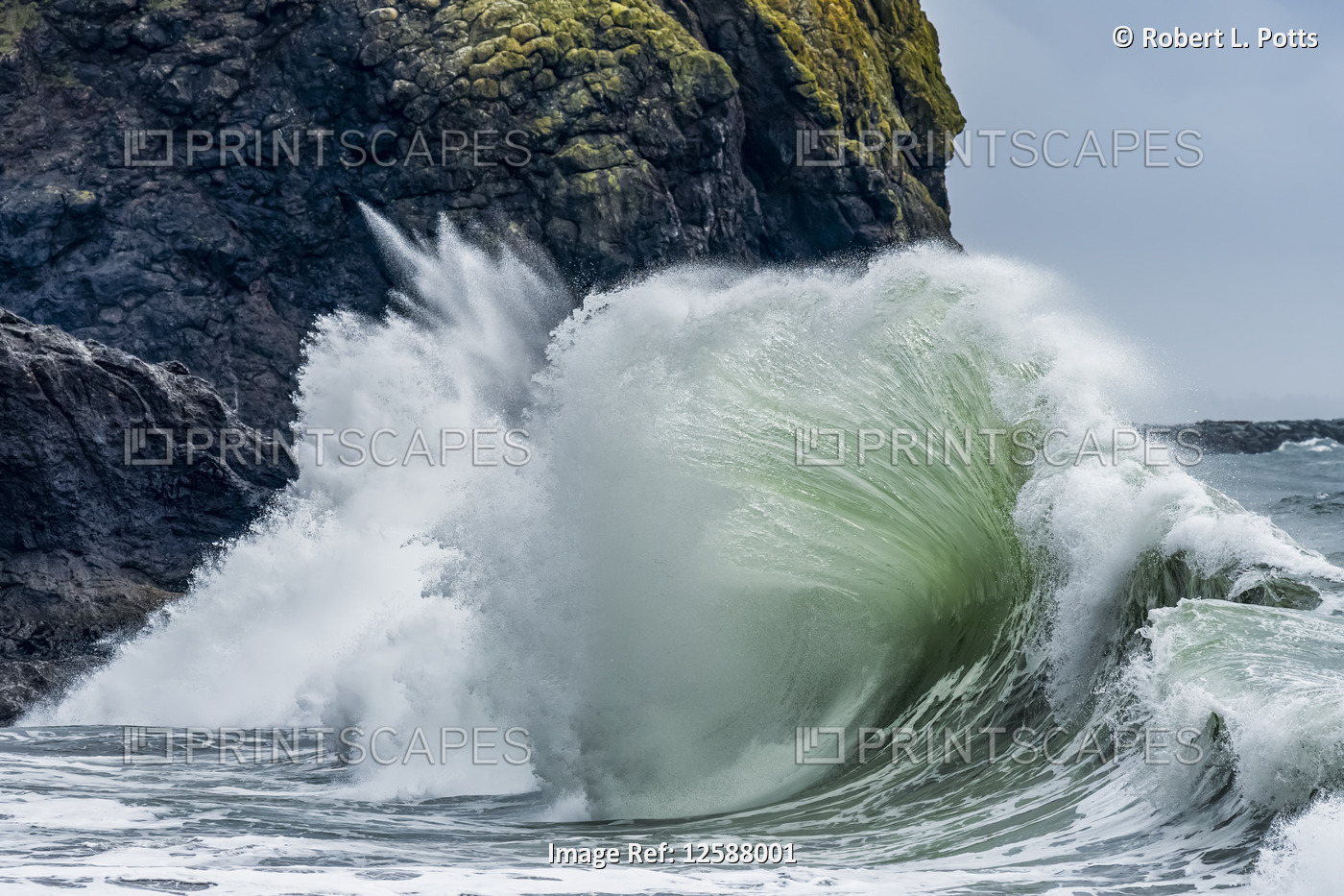 The crest of a wave fans out on the Washington Coast; Ilwaco, Washington, ...