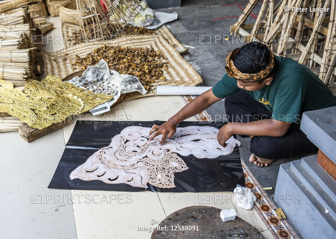 Man making a Lembu (bull-shaped coffin) for use in a Ngaben cremation ceremony, ...