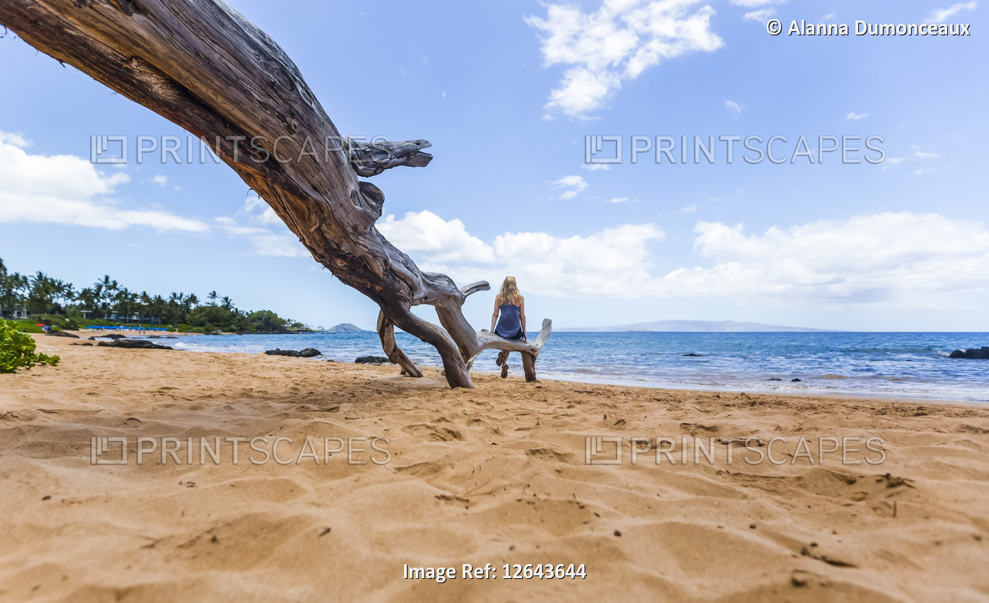 Woman watching the tranquil ocean, Maui, Hawaii, USA