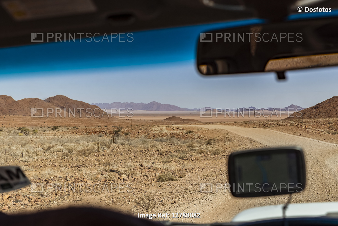 Driving on a long dry road, Namib Desert; Namibia