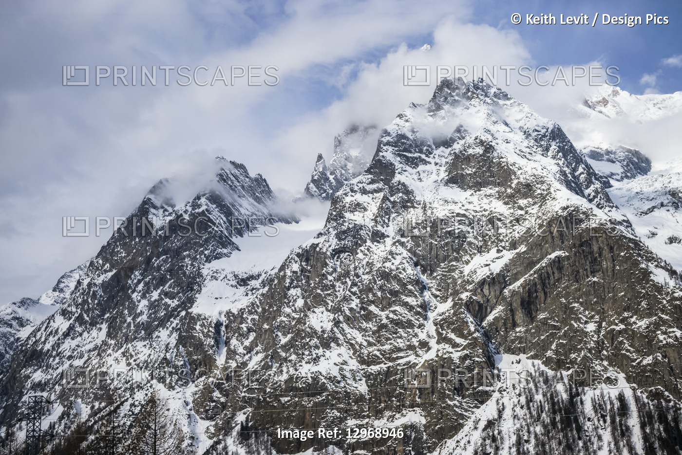 Rugged peaks of snow-covered mountains, Italian side of Mont Blanc; Courmayeur, ...