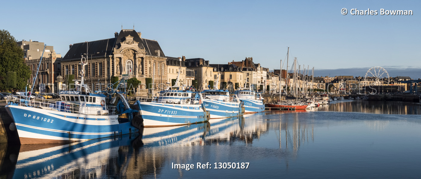 Panoramic of Dieppe with harbour full of boats and a ferris wheel; Dieppe, ...