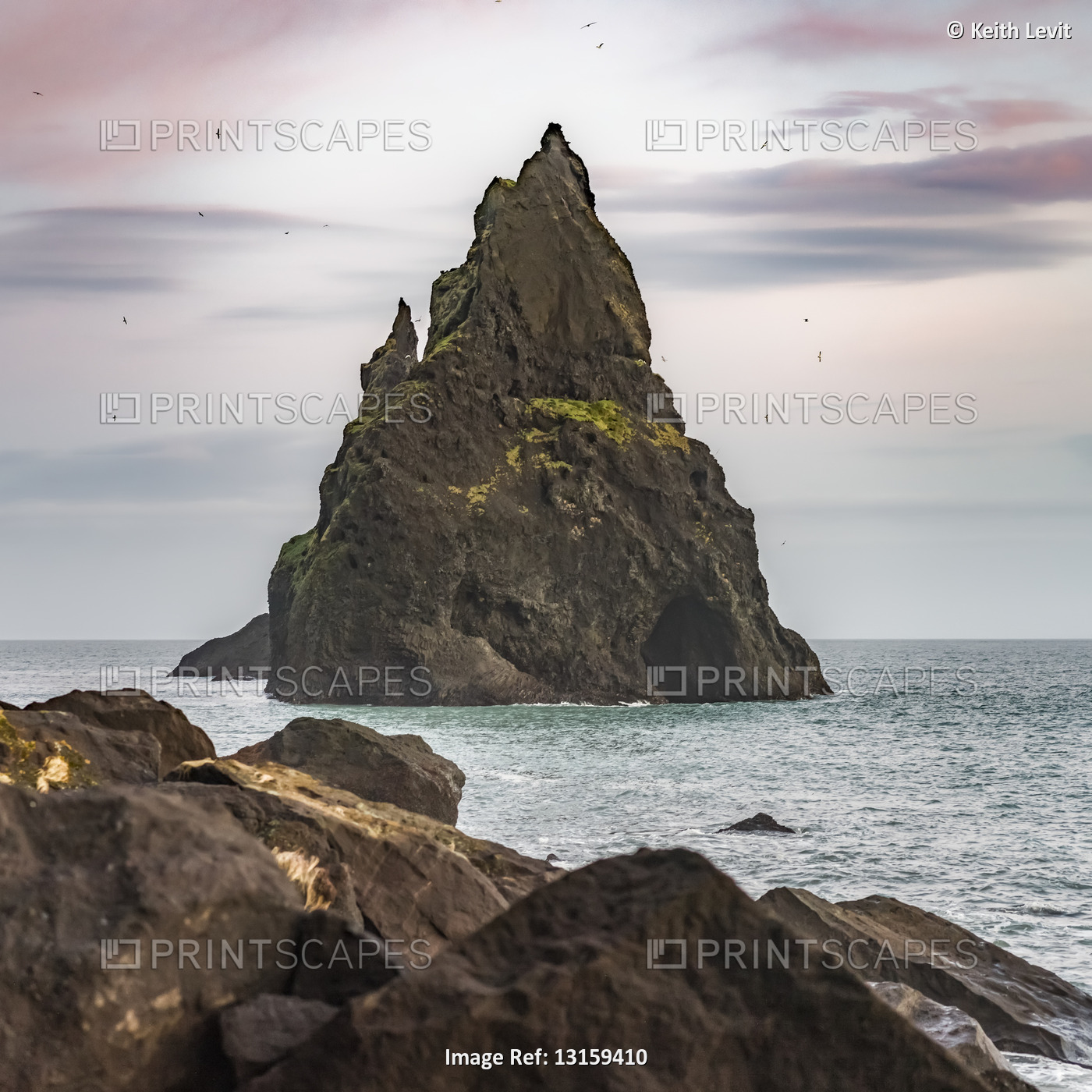 Rock formations along the coastline of the Southern Region of Iceland; ...