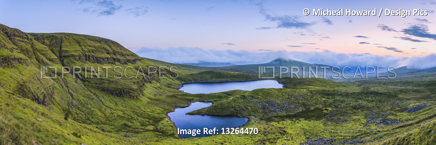 Panoramic view of two lakes in the Galty Mountains at dawn, panoramic stitched ...