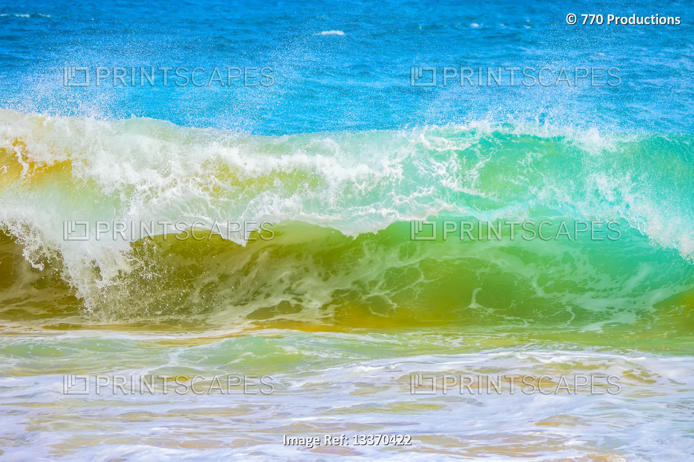 Splashing waves along the shore of sand; Oahu, Hawaii, United States of America
