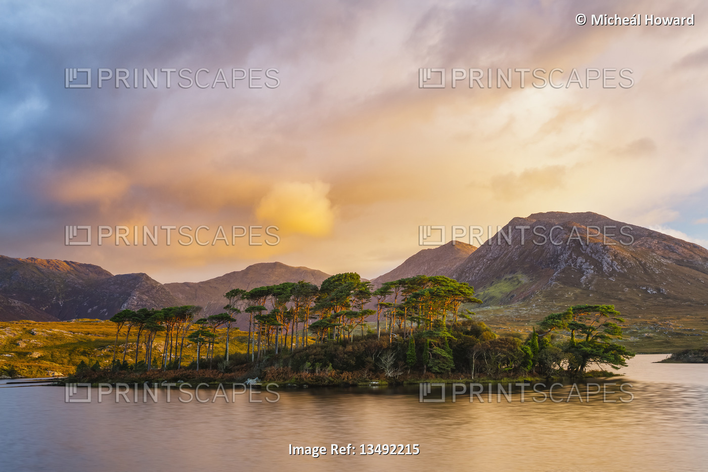 A dramatic sunrise over Derryclare Lough; Connemara, County Galway, Ireland