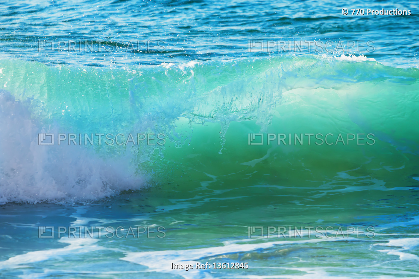 Turquoise water of a rolling wave at the shore; Oahu, Hawaii, United States of ...