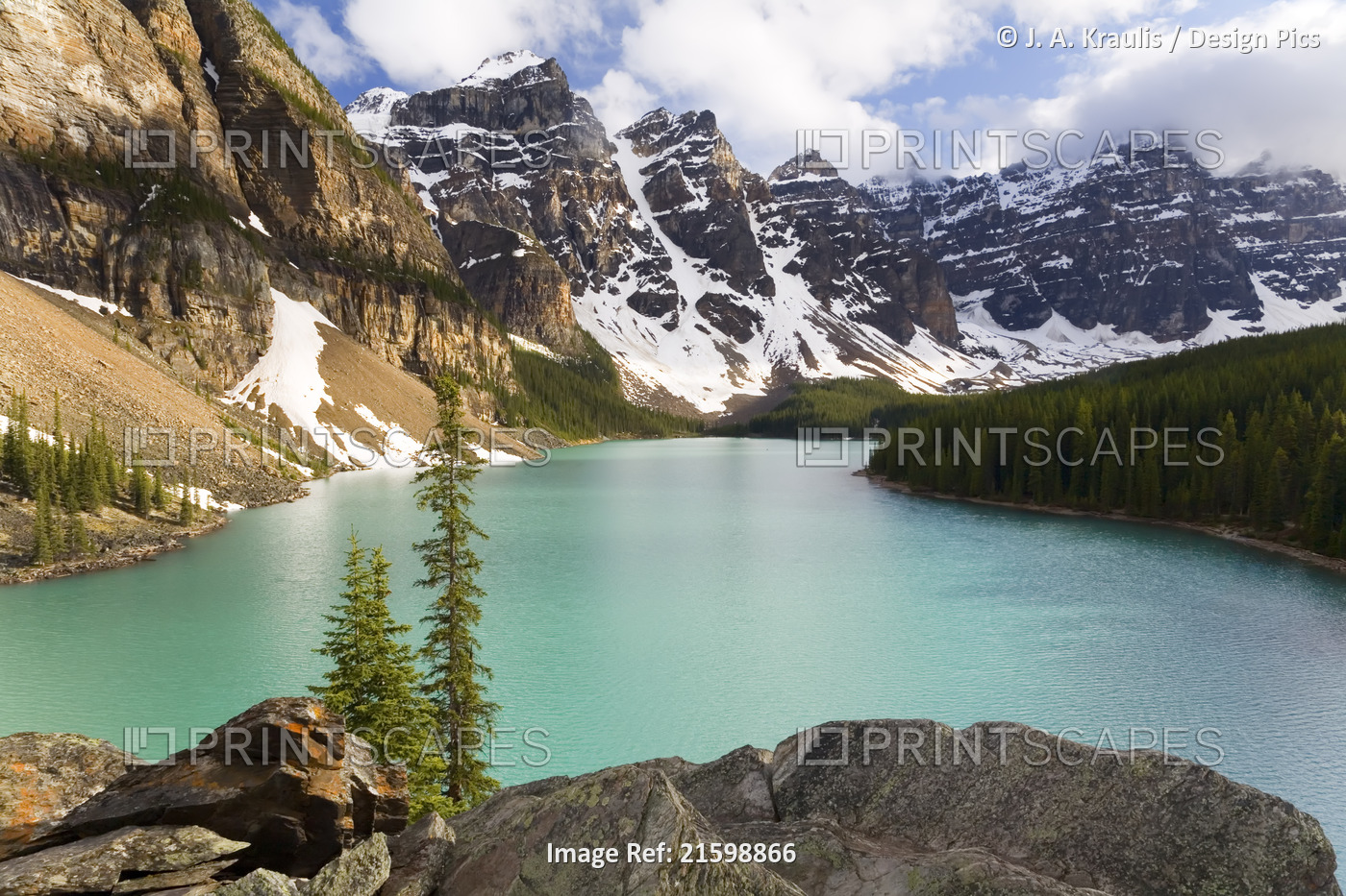 Tranquil Moraine Lake and the rugged peaks of the Rocky Mountains in Banff ...