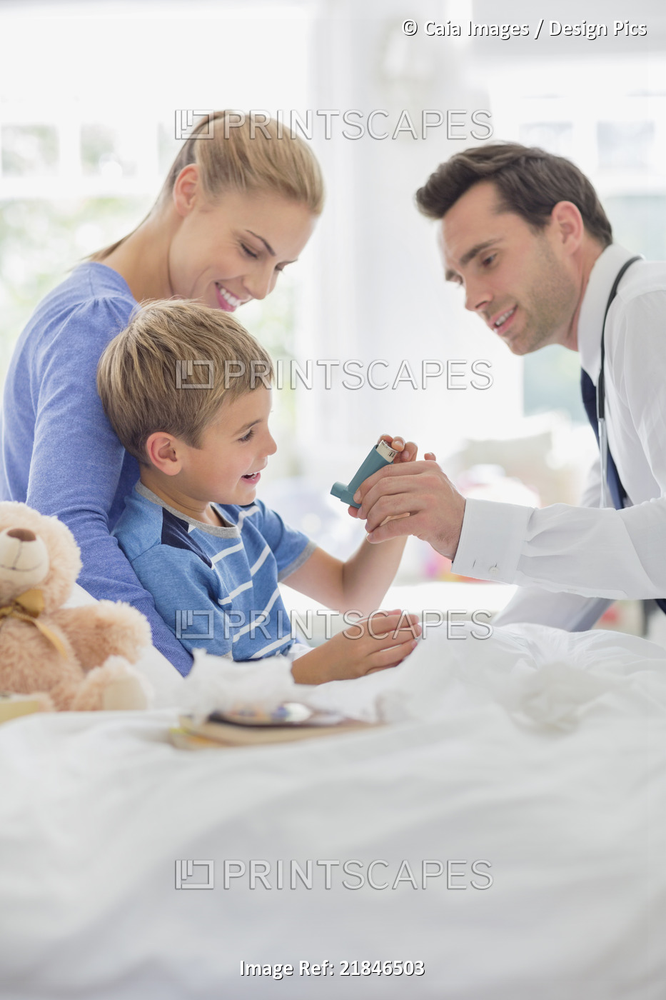 Doctor giving son asthma inhaler