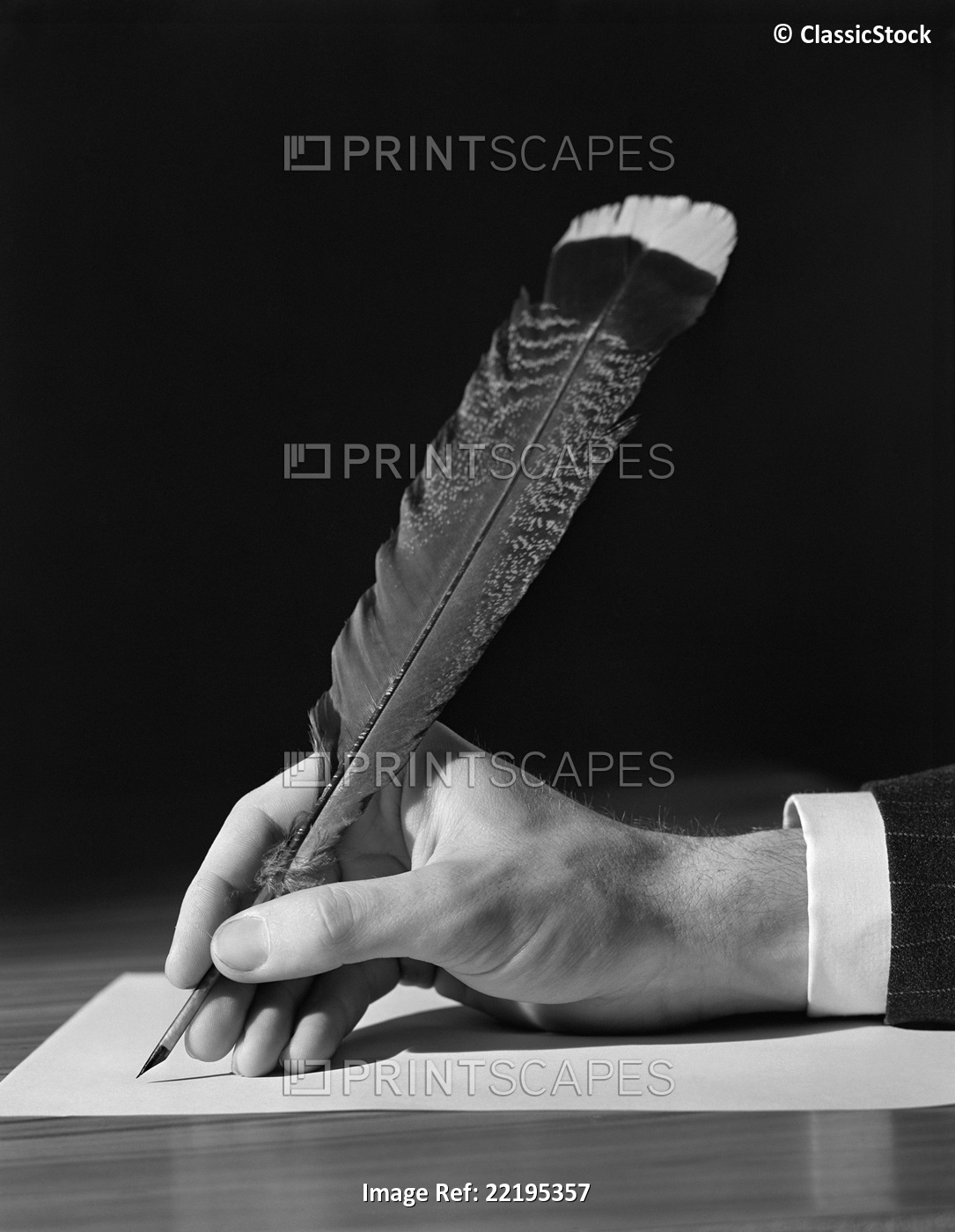 1930s MALE HAND WRITING WITH QUILL PEN FEATHER