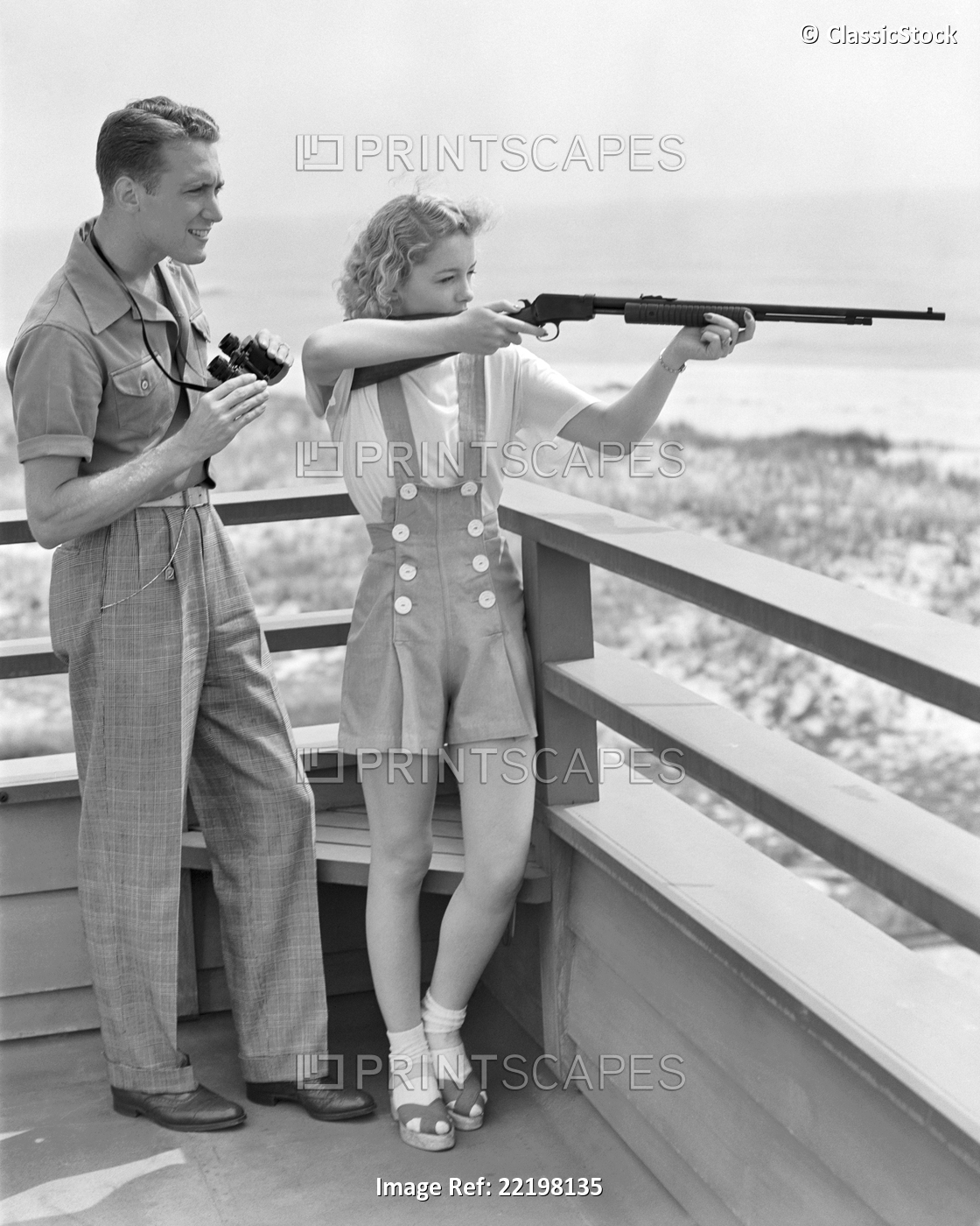 1940s YOUNG COUPLE SHOOTING 22 CALIBER PUMP RIFLE ATTRACTIVE BLOND WOMAN AIMING ...