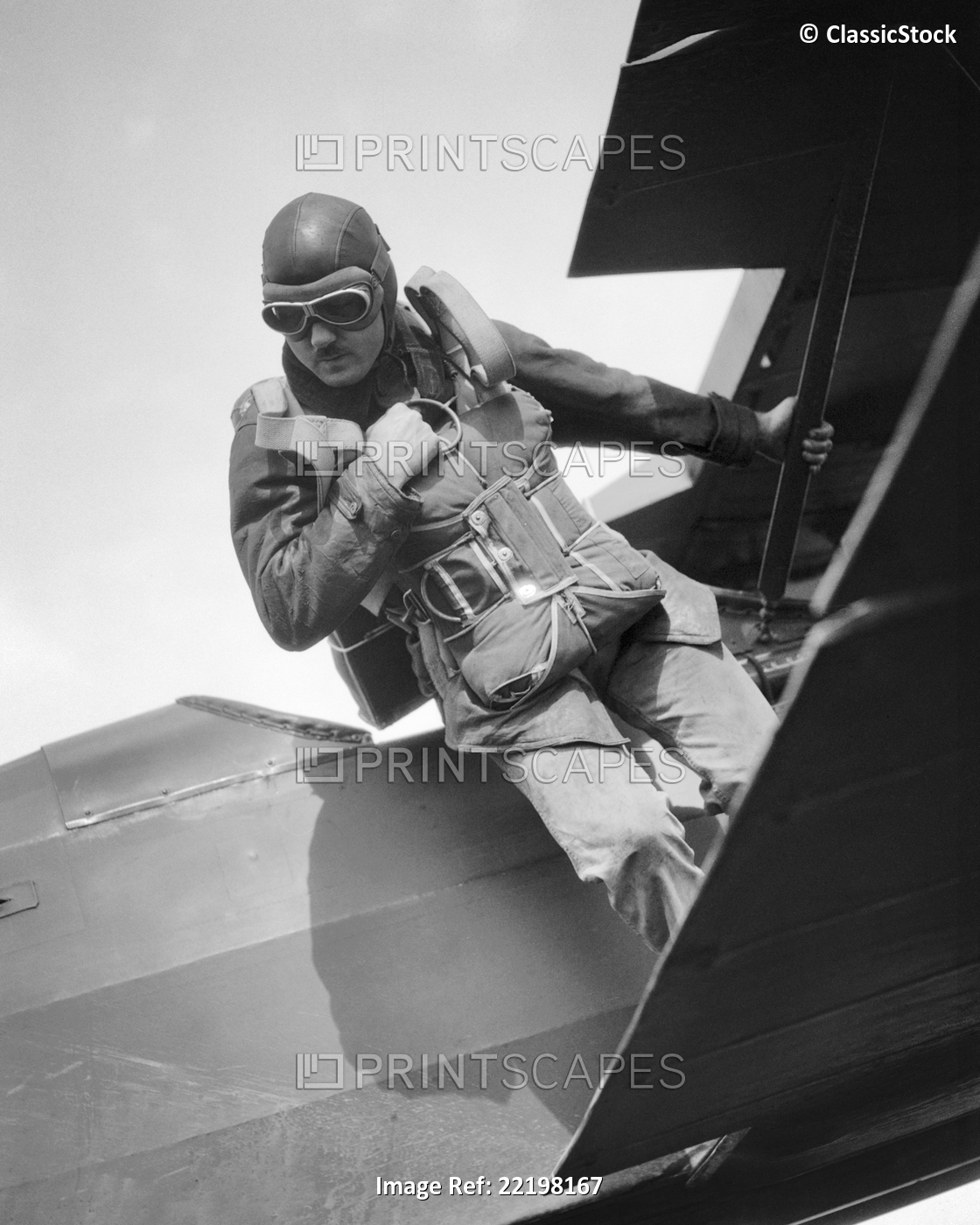 1930s  1940s ANONYMOUS MAN STANDING ON WING OF AIRPLANE ABOUT TO STEP DOWN OR ...