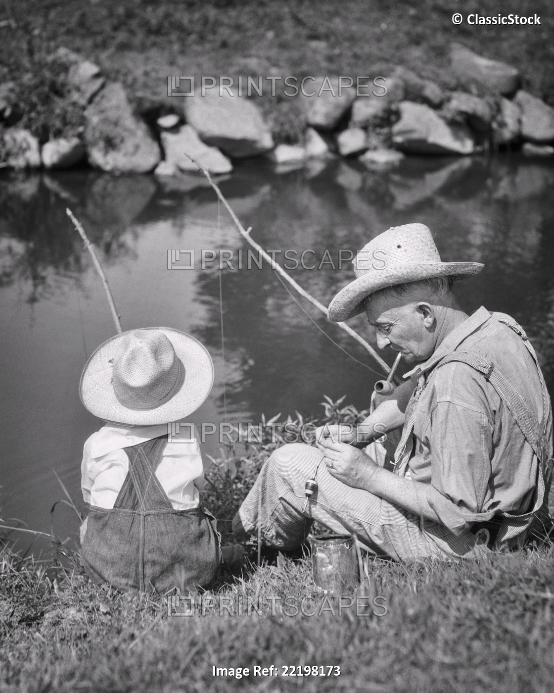 1930s GRANDFATHER AND GRANDSON WEARING STRAW HATS FISHING IN POND WITH STRING ...
