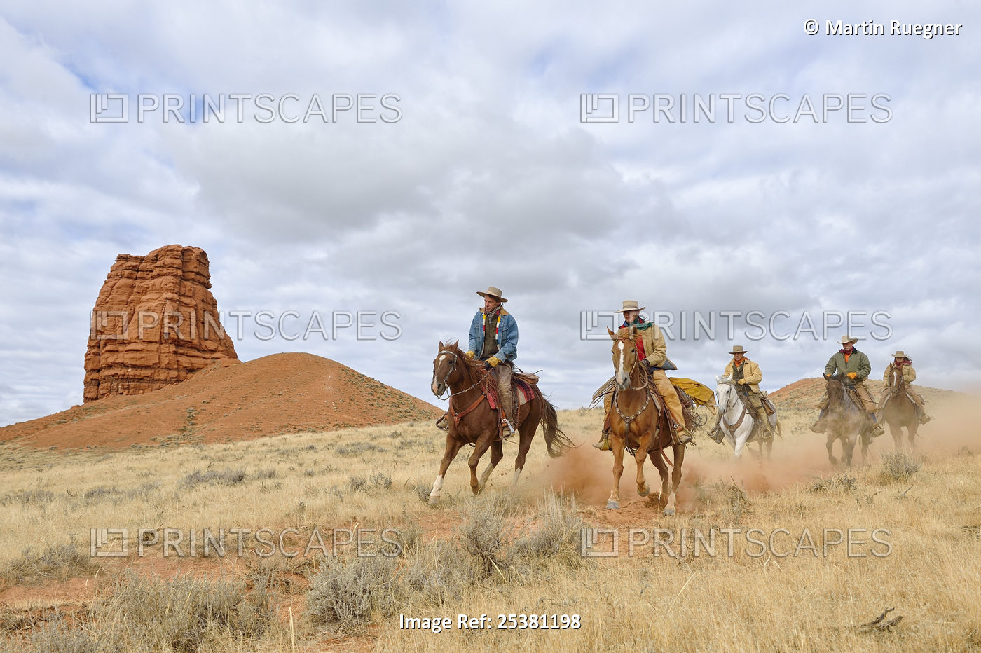 Cowboys and Cowgirls Riding Horses with Castel Rock in the background, Shell, ...