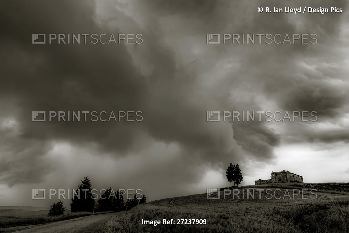 Rain storm approaching farm in Tuscany, Italy.