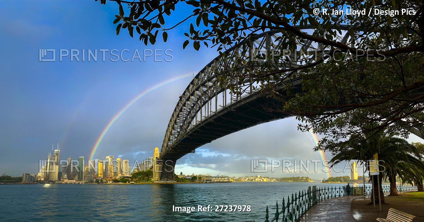 Rainbow over the Sydney Harbour Bridge, Sydney, New South Wales, Australia.