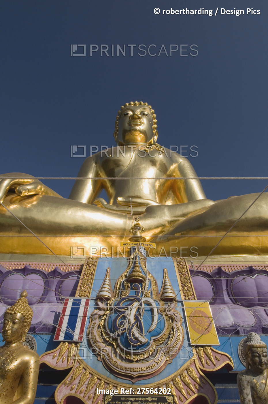 Huge golden Buddha on the banks of the Mekong River at Sop Ruak, Thailand, ...