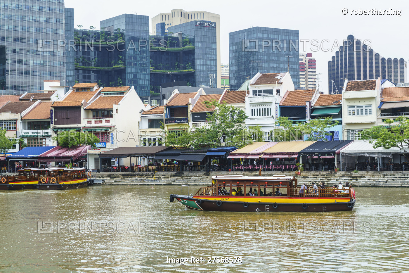 Tour boat passing Boat Quay, Singapore, Southeast Asia, Asia