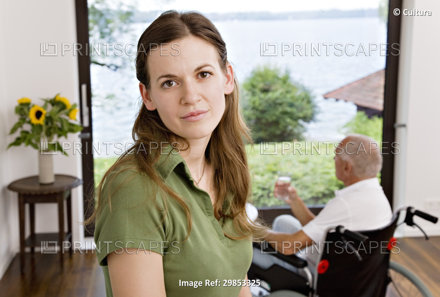 woman caring for man in wheelchair