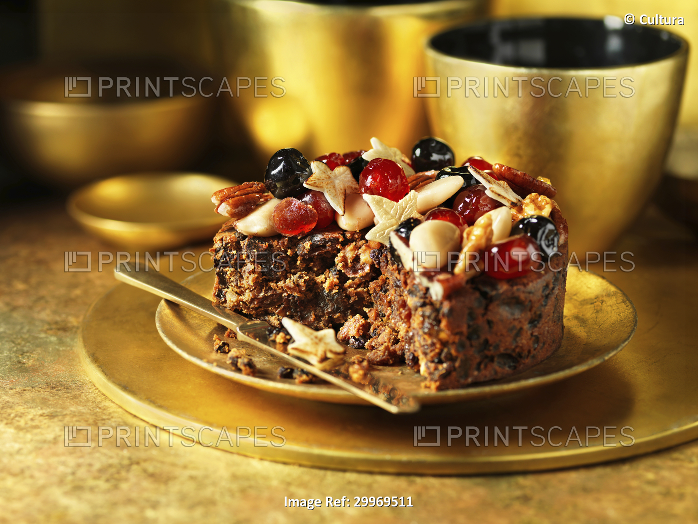 Fruit and nuts decorating traditional fruit christmas cake